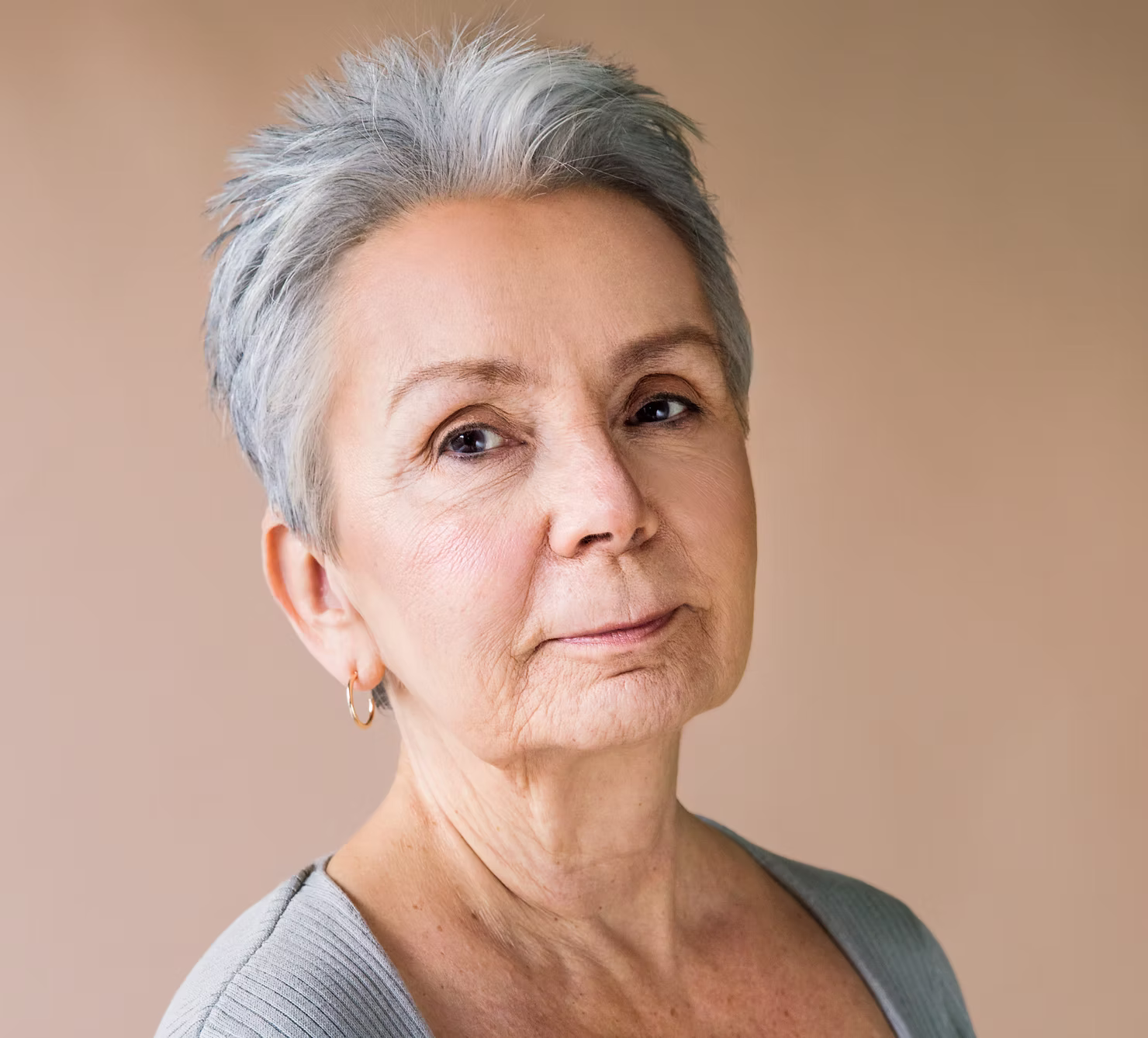 older woman after receiving botox to renew her skin